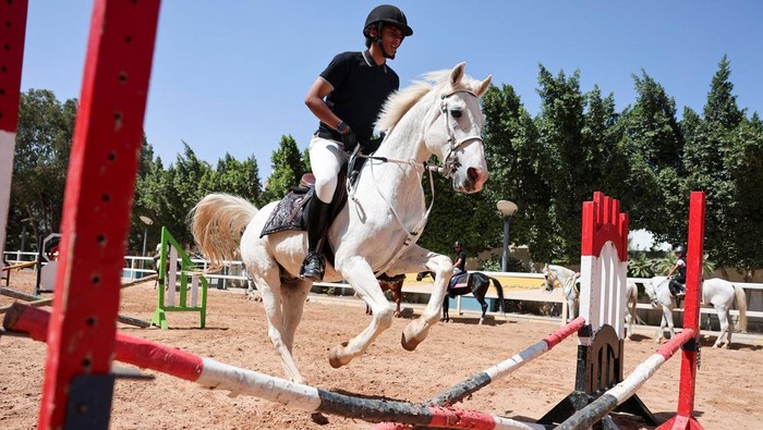 Riders participate in a tent pegging competition, as a funding crisis threatens Yemeni horse riders' dreams before regional World Cup qualifying competitions, in Sanaa, Yemen November 15, 2025. REUTERS/Khaled Abdullah