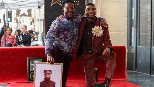 A photo of late filmmaker Chadwick Boseman sits next to a pair of shoes on his unveiled star on the Hollywood Walk of Fame in Los Angeles, California, U.S., November 20, 2025. REUTERS/Mario Anzuoni