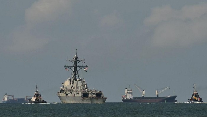 The USS Gravely, a US Navy warship, departs the Port of Port of Spain on October 30, 2025. The US warship arrived in Trinidad and Tobago on October 26, 2025, for joint exercises near the coast of Venezuela, as Washington ratcheted up pressure on drug traffickers and Venezuelan leader Nicolas Maduro. (Photo by MARTIN BERNETTI / AFP)