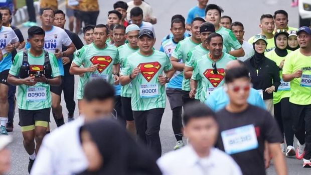 Polda Riau menggelar Brimob Run 2025 dalam memperingati HUT ke-80 Korps Brimob, Sabtu (22/11/2025).