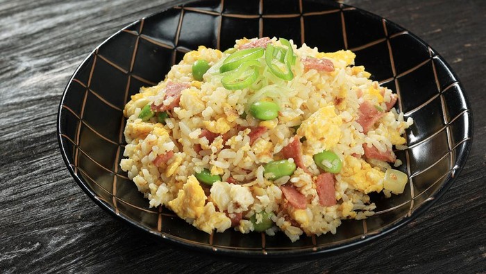 Yakimeshi, Japanese Fried Rice with Soy Sauce and Various Topping. Close Up