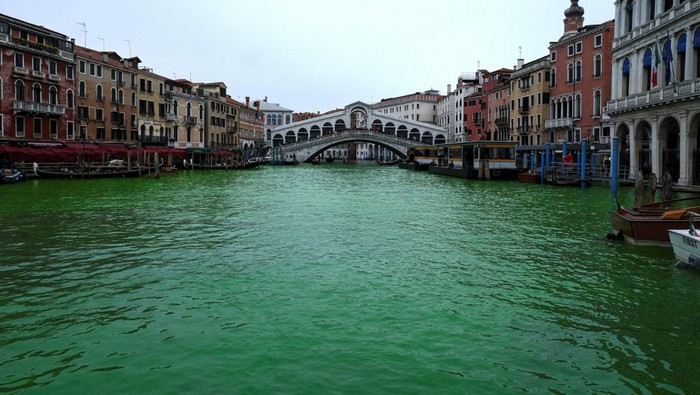 The Grand Canal, where the canal's water has been dyed green in a protest organised by the 