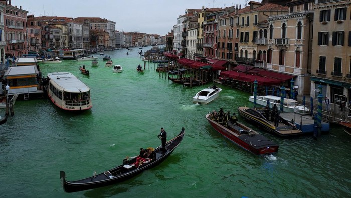 The Grand Canal, where the canal's water has been dyed green in a protest organised by the 