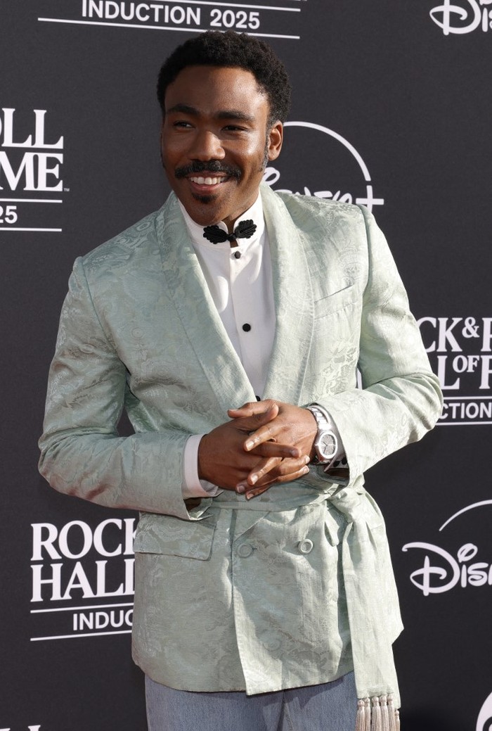 LOS ANGELES, CALIFORNIA - NOVEMBER 08: Donald Glover attends the 2025 Rock & Roll Hall of Fame Induction Ceremony at Peacock Theater on November 08, 2025 in Los Angeles, California.   Frazer Harrison/Getty Images for RRHOF/AFP (Photo by Frazer Harrison / GETTY IMAGES NORTH AMERICA / Getty Images via AFP)