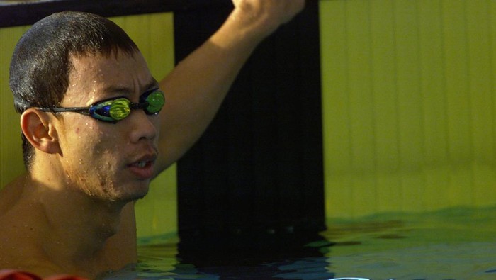 10 September 2001: Richard Sam Bera of Indonesia checks his time on the scoreboard after the Heat of the Mens 100m Freestyles held at the National Aquatics Centre, Kuala Lumpur, Malaysia during the 21st South East Asian Games. DIGITAL IMAGE. Mandatory Credit: Stanley Chou/ALLSPORT