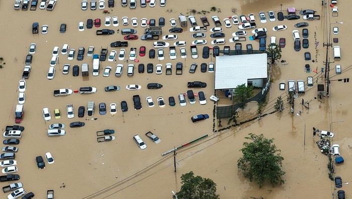 A drone view shows cars parked in a flooded area in Hat Yai district, affected by heavy rainfall, which has impacted 10 provinces in southern Thailand and killed several people, in Songkhla province, Thailand, November 25, 2025. REUTERS/Tannarin Suchipong