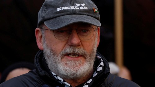 Actor Liam Cunningham leads demonstrators as they hold a banner in support of Palestinians during a march on the International Day of Solidarity, in Dublin, Ireland, November 29, 2025. REUTERS/Clodagh Kilcoyne