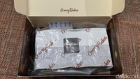 Browniesnya dikemas menggunakan double box agar aman dalam pengiriman. Lalu dalamnya juga dikemas lagi dengan plastik vacum sehingga lebih aman dan tahan lama. Foto: Detikcom / Atiqa Rana