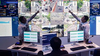 Personel kepolisian menunjuk kondisi lalu lintas melalui layar di pelayanan Smart Road Safety Policing di Polrestabes Bandung, Jawa Barat, Selasa (2/12/2025). ANTARA FOTO/Novrian Arbi