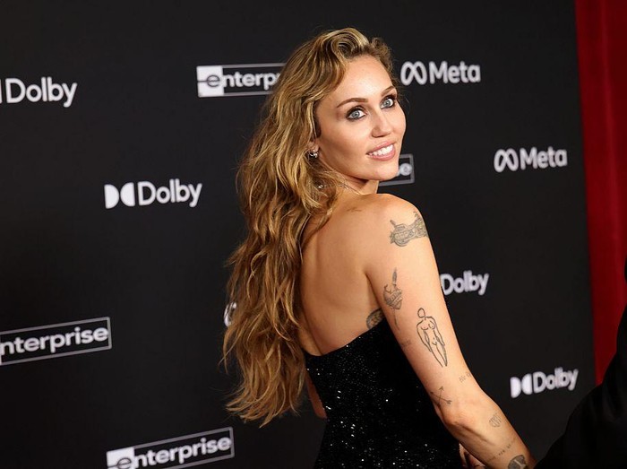 HOLLYWOOD, CALIFORNIA - DECEMBER 01: Miley Cyrus attends the Global Premiere of 20th Century Studios Avatar: Fire And Ash at Dolby Theatre on December 01, 2025 in Hollywood, California. (Photo by Kevin Winter/WireImage)