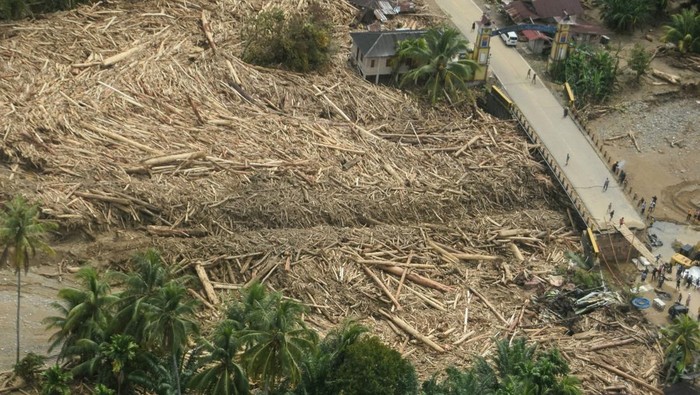 An aerial view of logs, which were swept away by a flash flood, stranded in Batang Toru, South Tapanuli, North Sumatra province, Indonesia, December 2, 2025. REUTERS/Stringer