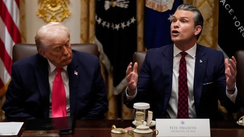 President Donald Trump closes his eyes as Defense Secretary Pete Hegseth speaks during a Cabinet meeting at the White House, Tuesday, Dec. 2, 2025, in Washington. (AP Photo/Julia Demaree Nikhinson)