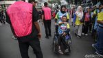 Semangat Inklusi Warnai Fun Walk Hari Disabilitas Internasional di Bundaran HI
