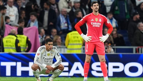 MADRID, SPAIN - DECEMBER 07: Jude Bellingham and Thibaut Courtois of Real Madrid look dejected following defeat in the LaLiga EA Sports match between Real Madrid CF and RC Celta de Vigo at Estadio Santiago Bernabeu on December 07, 2025 in Madrid, Spain. (Photo by Angel Martinez/Getty Images)