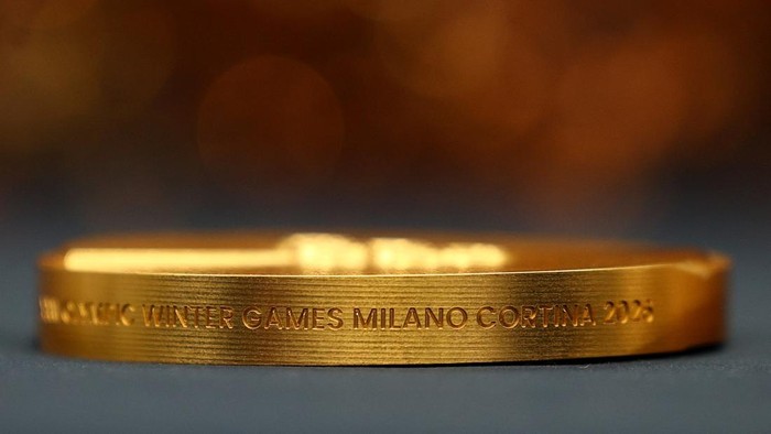 Samples of the silver, gold, and bronze medals of the 2026 Milano-Cortina Winter Olympics are displayed at the Italian Mint in Rome, Italy, December 5, 2025. REUTERS/Guglielmo Mangiapane