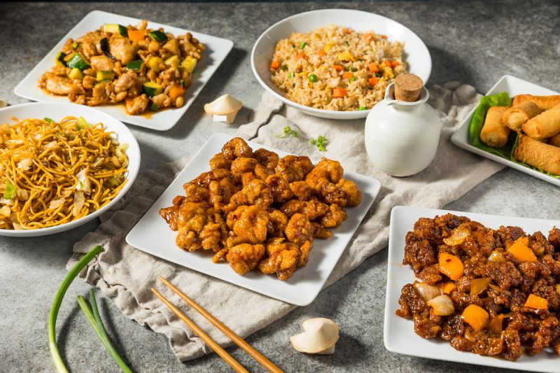 Chinese Fast Food Meal with Fried Rice Orange Chicken and Kung Pao