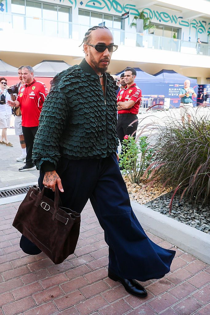 ABU DHABI, UNITED ARAB EMIRATES - DECEMBER 7: Lewis Hamilton of Great Britain and Ferrari walks in the paddock  during the F1 Grand Prix of Abu Dhabi at Yas Marina Circuit on December 7, 2025 in Abu Dhabi, United Arab Emirates. (Photo by Kym Illman/Getty Images)