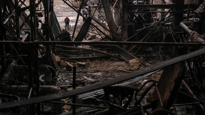 An employee walks at a thermal power plant damaged by recent Russian missile and drone strike, amid Russia's attack on Ukraine, in an undisclosed location of Ukraine December 10, 2025. REUTERS/Roman Baluk