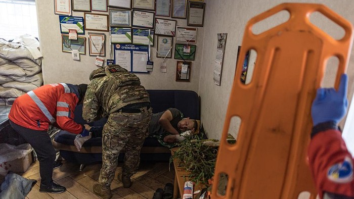 DRUZHKIVKA, UKRAINE - DECEMBER 15: Paramedics observe the scene of attack by a Russian FPV drone on a civilian tanker truck in Druzhkvivka, Donetsk Oblast, Ukraine on December 15, 2025. (Photo by Diego Herrera Carcedo/Anadolu via Getty Images)