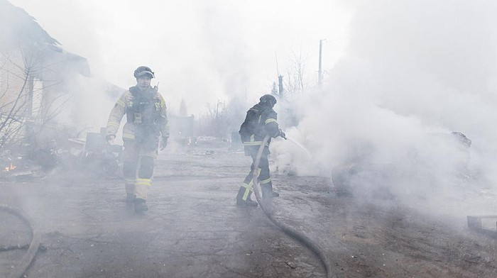 DRUZHKIVKA, UKRAINE - DECEMBER 15: Paramedics observe the scene of attack by a Russian FPV drone on a civilian tanker truck in Druzhkvivka, Donetsk Oblast, Ukraine on December 15, 2025. (Photo by Diego Herrera Carcedo/Anadolu via Getty Images)
