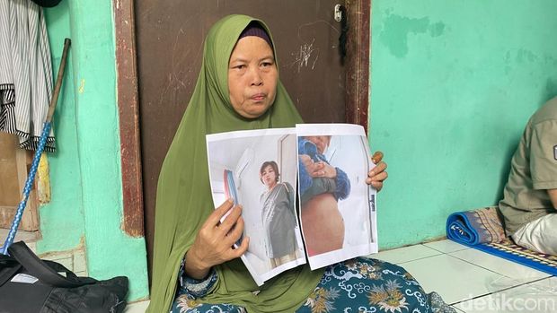 Isop saat menunjukkan foto adiknya, Lanti di China