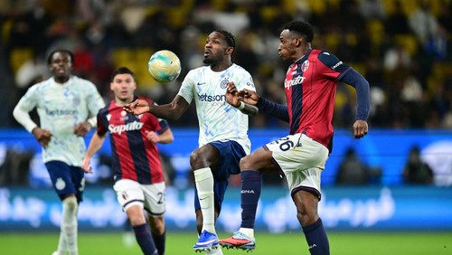 Soccer Football - Supercoppa Italiana - Semi Final - Bologna v Inter Milan - Al Awwal Park, Riyadh, Saudi Arabia - December 19, 2025 Bolognas Riccardo Orsolini celebrates scoring their first goal with Nikola Moro and Emil Holm REUTERS/Guglielmo Mangiapane