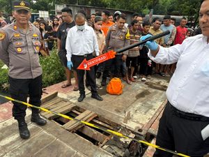 Mayat Pria Setengah Bugil Ditemukan Dalam Got di Bitung