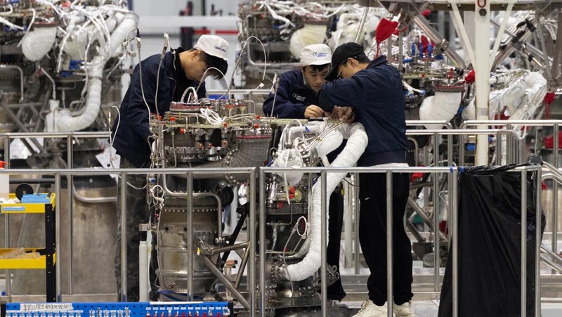 Engineers work on a rocket engine at the assembly hall at China’s private rocket company LandSpace's factory in Huzhou, Zhejiang province, China, December 17, 2025. REUTERS/Maxim Shemetov