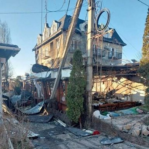 This handout photo released by Russia-appointed governor of the Kherson region, Vladimir Saldo, shows the site of a drone attack on a hotel in Khroly on January 1, 2026. Russia on Thursday said Kyiv was behind a deadly drone strike on a hotel in the Moscow-held part of Ukraines southern Kherson region that killed at least 20 people celebrating the New Year. The accusations come at a crunch moment in a flurry of talks aimed at brokering peace and ending the near four-year war and as   Ukrainian President Volodymyr Zelensky said his country was 10 percent away from a peace deal. According to a Russia-appointed governor of the Kherson region, Vladimir Saldo, last night three drones struck a cafe and hotel on the Black Sea coast in Khorly where civilians were celebrating the New Year. (Photo by The Governor of Kherson region Vladimir Saldo / AFP) / RESTRICTED TO EDITORIAL USE - MANDATORY CREDIT AFP PHOTO /  - / HANDOUT /   - NO MARKETING NO ADVERTISING CAMPAIGNS - DISTRIBUTED AS A SERVICE TO CLIENTS