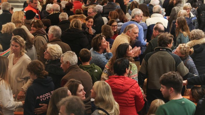 Emergency personnel work outside the 