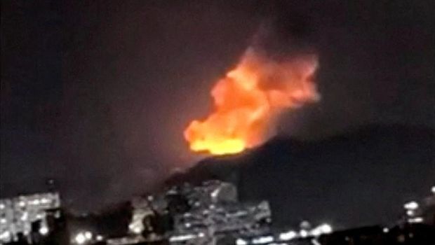 Helicopters fly past plumes of smoke rising from explosions, in Caracas, Venezuela, January 3, 2026 in this screen grab obtained from video obtained by Reuters. Video Obtained by Reuters/via REUTERS  THIS IMAGE HAS BEEN SUPPLIED BY A THIRD PARTY. NO RESALES. NO ARCHIVES. NEWS USE ONLY. THIS PICTURE WAS PROCESSED BY REUTERS TO ENHANCE QUALITY. AN UNPROCESSED VERSION HAS BEEN PROVIDED SEPARATELY.  VERIFICATION: - Mountains, towers and buildings match satellite and file imagery of Caracas  - Date verified by multiple corroborating videos of strikes on Caracas      TPX IMAGES OF THE DAY