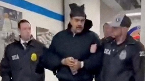 A still image from video posted by the White Houses Rapid Response 47 account on X.com, which originated from the @PaulDMauro account, shows Venezuelas President Nicolas Maduro being walked in custody down a hallway at the offices of the U.S. Drug Enforcement Administration (DEA) in New York City, U.S., January 3, 2026. @RapidResponse47/Handout via REUTERS THIS IMAGE HAS BEEN SUPPLIED BY A THIRD PARTY. MANDATORY CREDIT.NO RESALES. NO ARCHIVES.