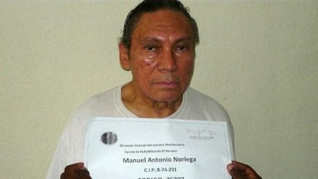 PANAMA-NORIEGA Handout picture released on December 14, 2011 by Panama's Ministry of Government of former Panamanian dictator Manuel Noriega having his mug shot being taken at El Renacer penitentiary, 25 km southeast of Panama City. Noriega could face more legal battles including a criminal case and lawsuits for human rights abuses, officials said Monday a day after he returned home to serve jail time. AFP PHOTO/MINISTERIO DE GOBIERNO RESTRICTED TO EDITORIAL USE-NO MARKETING-NO ADVERTISING CAMPAIGNS-MANDATORY CREDIT 'AFP PHOTO/MINISTERIO DE GOBIERNO' -DISTRIBUTED AS A SERVICE TO CLIENTS (Photo by HO / MINISTERIO DE GOBIERNO / AFP)
