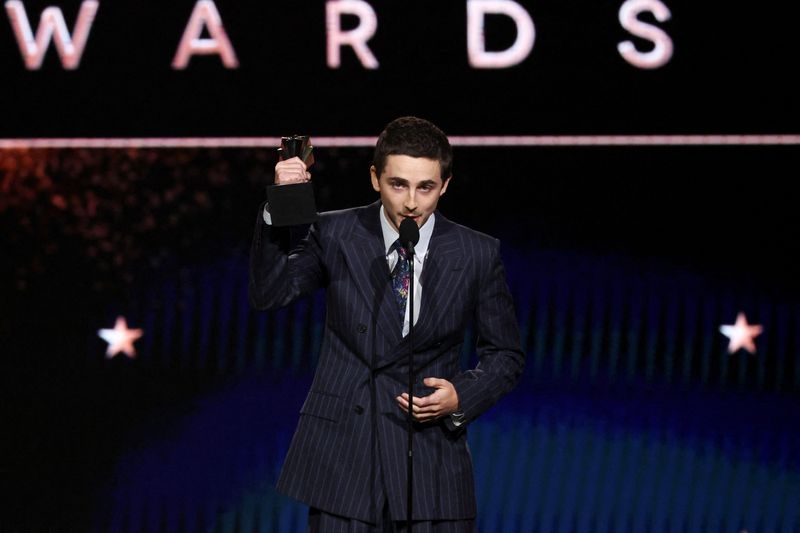 Timothee Chalamet accepts the Best Actor Award for 