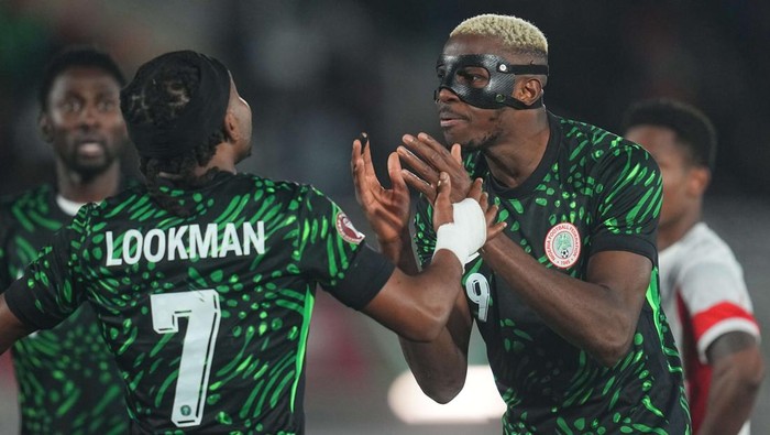 Victor James Osimhen of Nigeria and Ademola Olajide Lookman of Nigeria gestures  during the AFCON Group C match between Mozambique and  Nigeria at Fes stadium, Fes, Morocco on January 5, 2026.  (Photo by Ulrik Pedersen/NurPhoto via Getty Images)