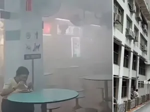 Viral! Wanita Ini Tetap Santuy Makan Kwetiau saat Terjadi Kebakaran