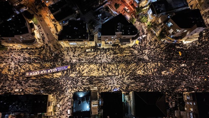 Ultra-Orthodox Jewish men protest against pressure to conscript men from their community into Israel's military, in Jerusalem, January 6, 2026. REUTERS/Ammar Awad
