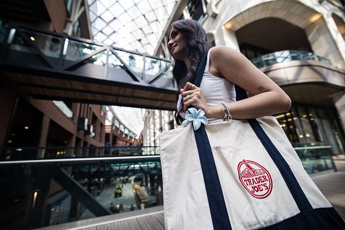 Toronto, ON - July 30: Pooja Gandhi proudly shows off her Trader Joes tote, which has been dubbed the Toronto bag of the summer. PD Nick Lachance/Toronto Star Nick Lachance/Toronto Star        (Nick Lachance/Toronto Star via Getty Images)