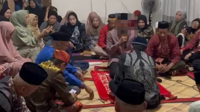 Suami NIM, inisial AW saat melangsungkan pernikahan dengan wanita lain berinisial IRH di bulan Oktober 2025.