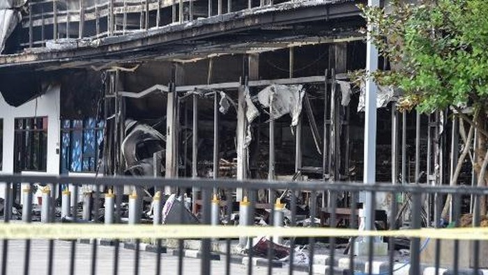 A general view shows a damaged building after a bomb attack at a PTT petrol station in Thailands southern province of Narathiwat on January 11, 2026. (Photo by Madaree TOHLALA / AFP)