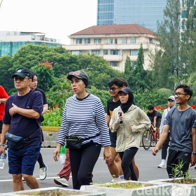 Meski Diguyur Hujan, CFD Sudirman Tetap Jadi Favorit Warga