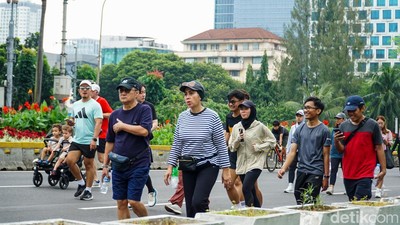 Meski Diguyur Hujan, CFD Sudirman Tetap Jadi Favorit Warga