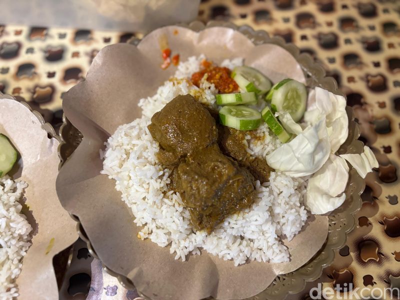 Penjual nasi bebek berusia 102 tahun Penjual nasi bebek berusia 102 tahun.