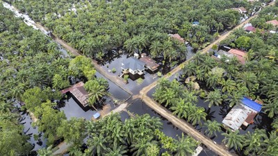 Foto Udara Luapan Sungai Dendang Rendam Desa Jati Mulyo Jambi