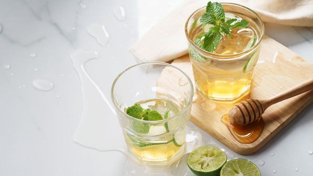 Ilustrasi jeruk nipis dan madu Ilustrasi jeruk nipis dan madu