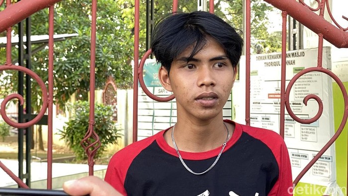 Driver ojol saat membuat laporan polisi