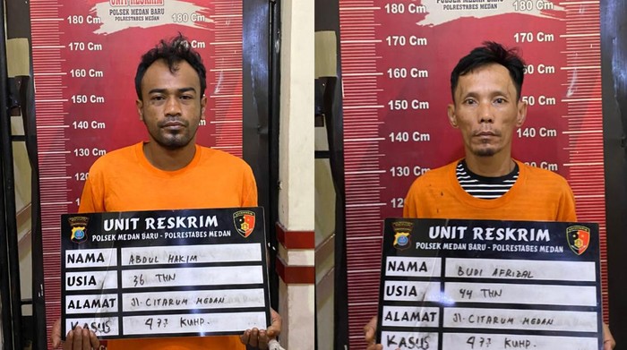 Kedua pelaku saat diamankan petugas kepolisian. (dok. Polsek Medan Baru)