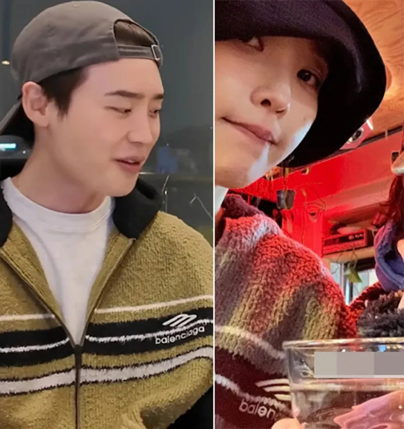 Lee Jong Suk dan IU memakai jaket couple keluaran Balenciaga.