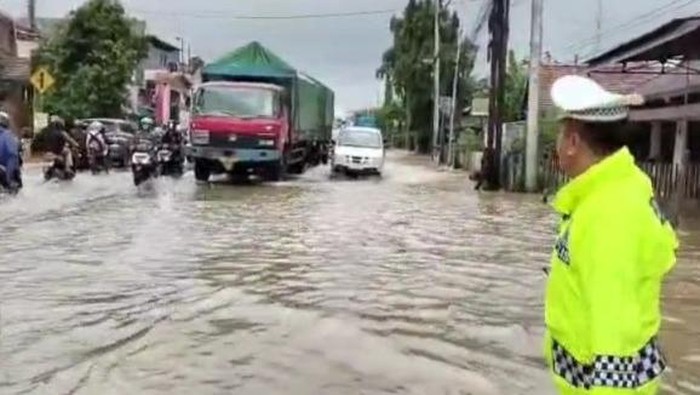 Situasi genangan banjir di Pantura Kudus tepatnya Desa Ngembalrejo Kecamatan Bae, Selasa (13/1/2026).