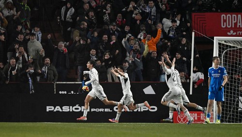 Soccer Football - Copa del Rey - Round of 16 - Albacete v Real Madrid - Estadio Carlos Belmonte, Albacete, Spain - January 14, 2026 Albacetes Javi Villar celebrates scoring their first goal with teammates REUTERS/Pablo Morano